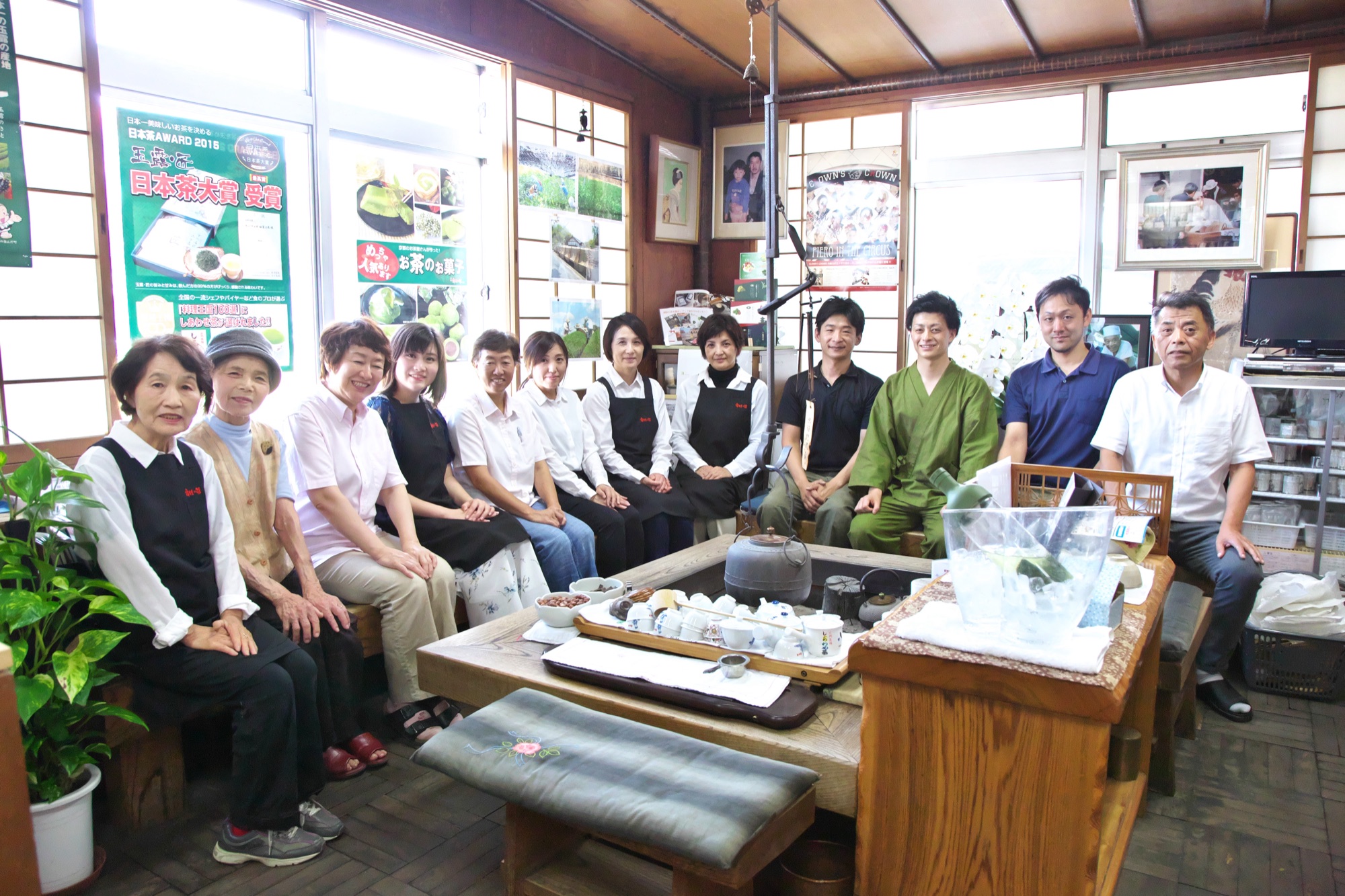 Masayasu Tamiya, third generation, seated with the Maiko Tea family in the Kyotanabe shop